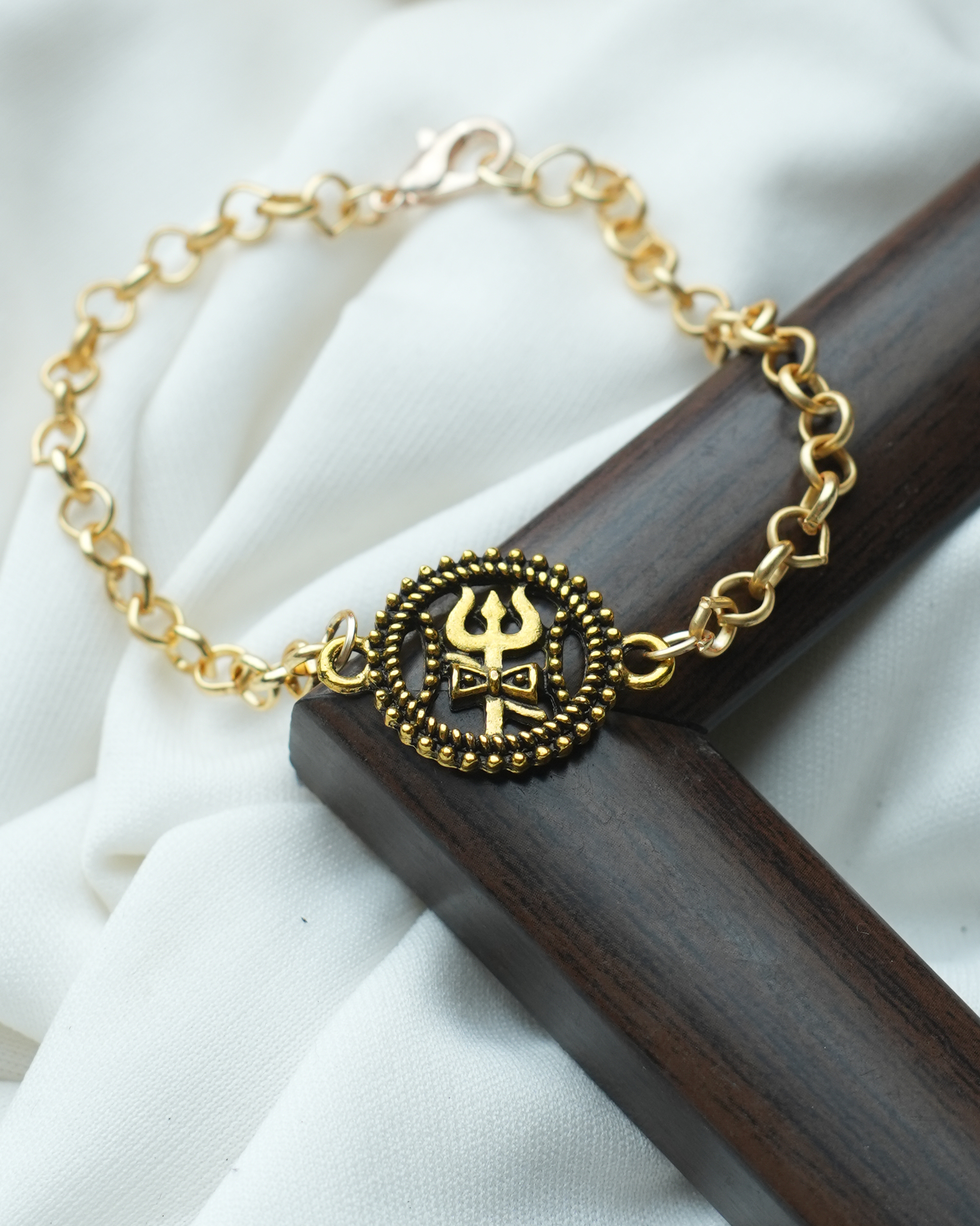tatva-bracelet-|-golden-chain-with-gold-oxidised-trishul-bracelets-tatvayog-bracelet