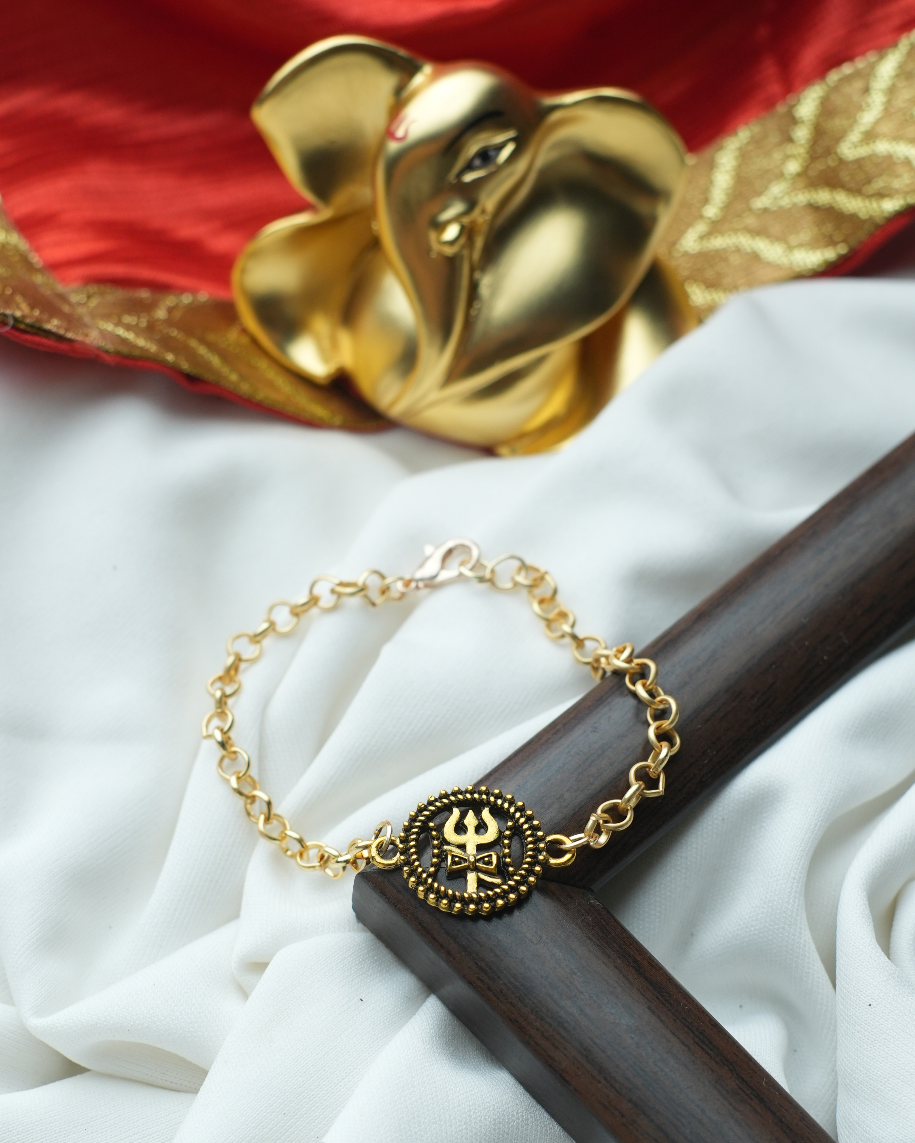 tatva-bracelet-|-golden-chain-with-gold-oxidised-trishul-bracelets-tatvayog-bracelet